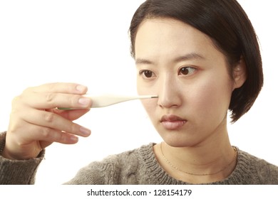 Woman Checking Body Temperature, Isolated On White