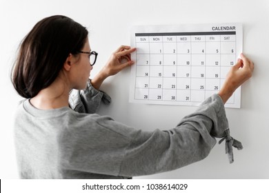 Woman checking the calendar