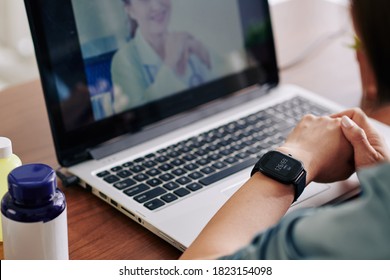 Woman Checking Her Blood Pressure Via Application On Smartwatch And Telling It To Virtual Doctor