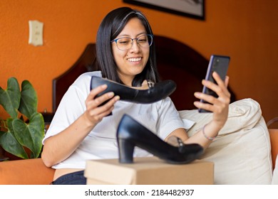 A Woman Checking Her New Shoes Purchased Online