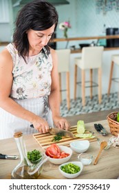 Woman Chef Chopping Herbs For Preparing A Gazpacho, Spanish Traditional Cold Soup