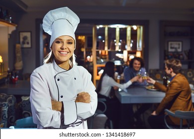 Woman Chef In A Restaurant.