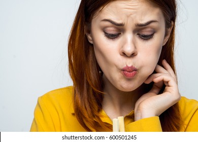 A Woman Chewing Food