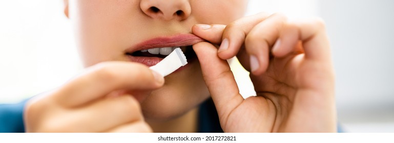 Woman Chewing Wet Moist Nicotine Tobacco Snus Product