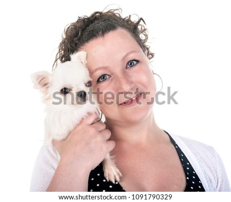 woman and chihuahua in front of white background