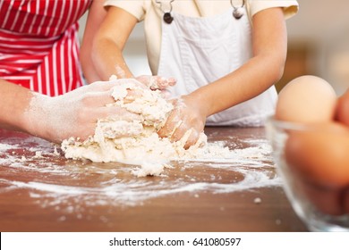 Woman And Child Coocking.