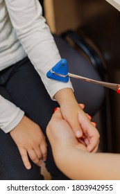 Woman Child Neurologist Examines The Girl In The Office.