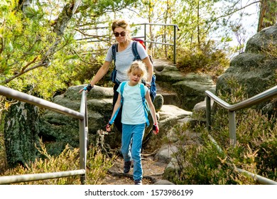 Woman With Child While Hiking In Saxon Switzerland