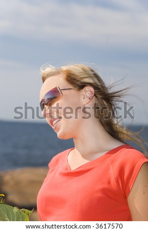 Similar – Portrait of a young woman on the beach