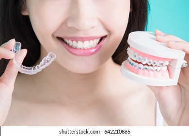 woman choicce different brace on green background - Shutterstock ID 642210865