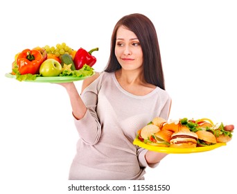 Woman Choosing Between Healthy And Unhealthy Eating.