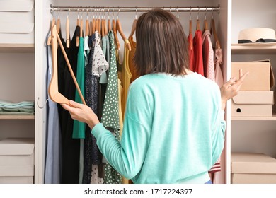 554 Confused woman wardrobe Images, Stock Photos & Vectors | Shutterstock