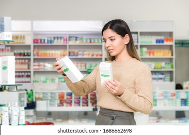 Woman Choosing Vitamins And Supplements For Immune System. Coronavirus Pandemic Necessity