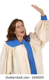 Woman In Church Choir Robe With Her Arms Raised Singing In Charismatic Praise To God.  Shot Isolated On White Background.  Horizontal Orientation.