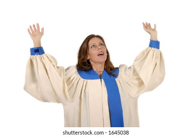 Woman In Church Choir Robe With Her Arms Raised In Charismatic Praise To God.  Shot Isolated On White Background.  Horizontal Orientation.