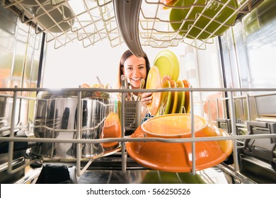 Woman Cleaning Dishwasher
