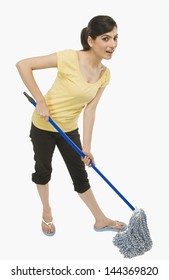 Woman Cleaning Floor With A Mop