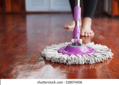 Woman Cleaning Floor With Mop