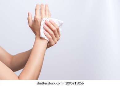 Woman Cleaning Her Hands With White Soft Tissue Paper. Isolated On A White Backgrounds