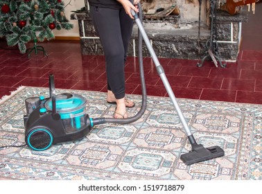 Woman Cleaning House Before New Year  Party. Cleaning After Christmas Dinner.