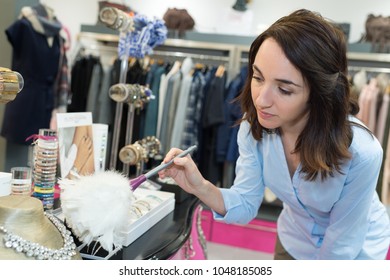 Woman Cleaning Jewellery