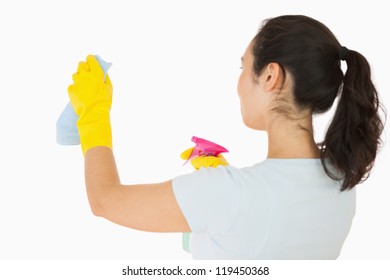 Woman Cleaning Walls In A White Background