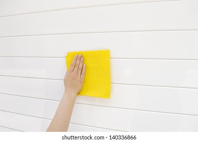  Woman Cleaning White Metal Garage Door