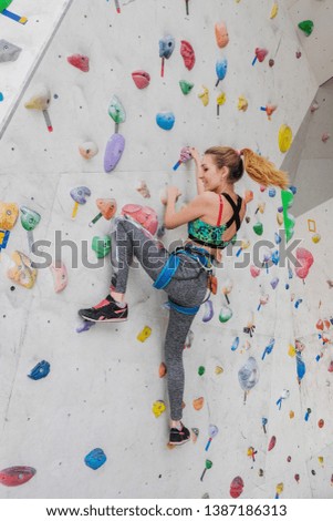 Similar – Image, Stock Photo Girl climbs climbing wall