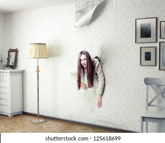 Woman Climbs Through The Wall Into The Room