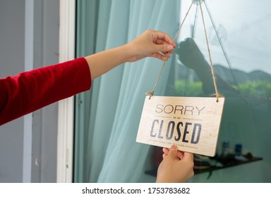 Woman Closed Store With Sign Board Front Door Shop, Small Business Come Back Turning Agian After The Situation Is Resolved.