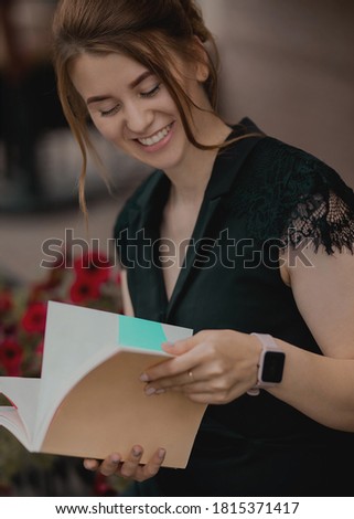 woman close-up with a book in her hands