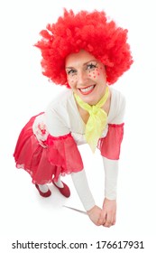 Woman Clown With Red Hair On A White Background