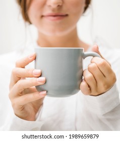 Woman With A Coffee Cup Mockup