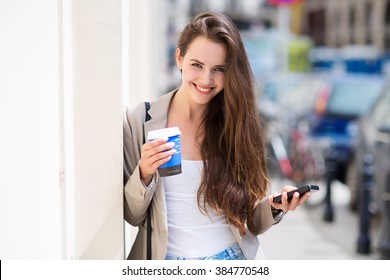 Woman With Coffee To Go