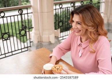 Woman Coffee Snack Smiling Outdoors Patio - Powered by Shutterstock