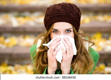 Woman with a cold - Powered by Shutterstock