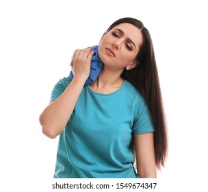 Woman With Cold Compress Suffering From Neck Pain On White Background