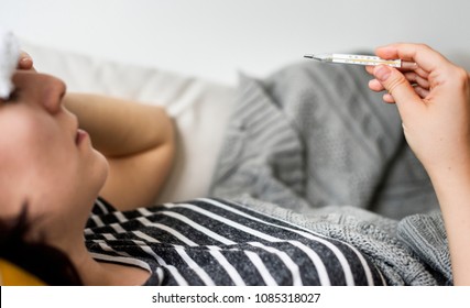 Woman With A Cold And High Fever