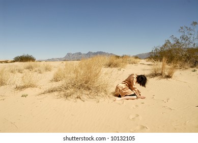 Woman Collapsed In The Desert. Seeker Of The Mirage. Or Journey Of The Lost Soul.