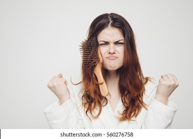 Woman With Comb Tangled Hair Problem