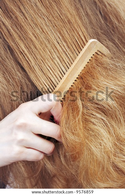 Woman Combing Long Blond Wavy Hair Stock Photo Edit Now 9576859