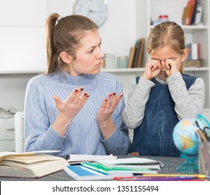 Woman complaining about poor academic performance of her daughter