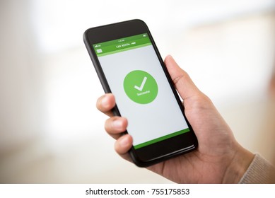 Woman completing car rental booking reservation on mobile smartphone after successful online payment confirmed - Shutterstock ID 755175853