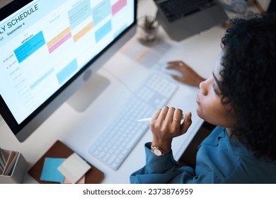 Woman with computer, thinking and checking schedule, agenda and reminder for office administration. Online calendar, planner and girl at desk planning spreadsheet for time management with high angle.