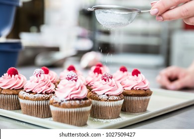 Woman In Confectionary Icing Yummy Cupcakes With Sugar