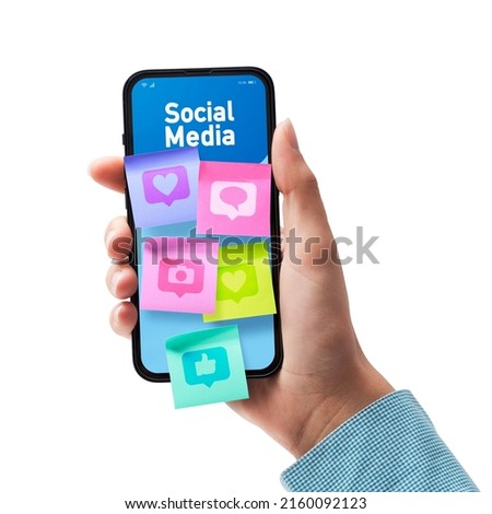 Woman connecting with social media online: sticky notes with icons on smartphone screen, POV shot On white background