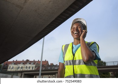 Woman Construction Worker On Phone