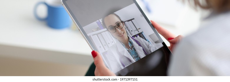 Woman Consults With Doctor Via Internet Via Video Call