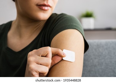 Woman With Contraception Patch Treatment On Arm