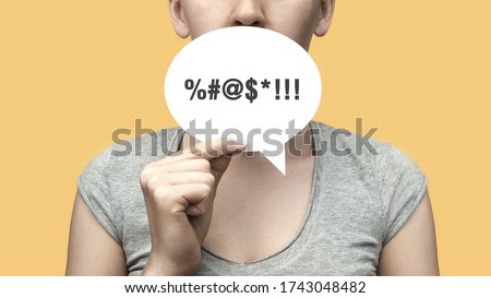 A woman with a conversational cloud in her hand and an obscenity symbol on it. Ban on swearing, obscenities